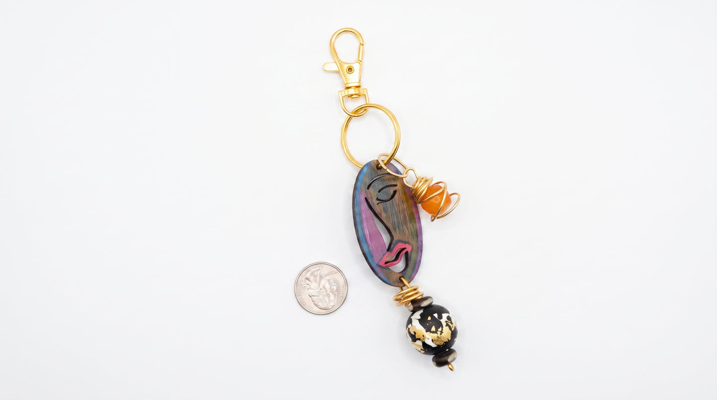Artistic Keychain with Abstract Face Design